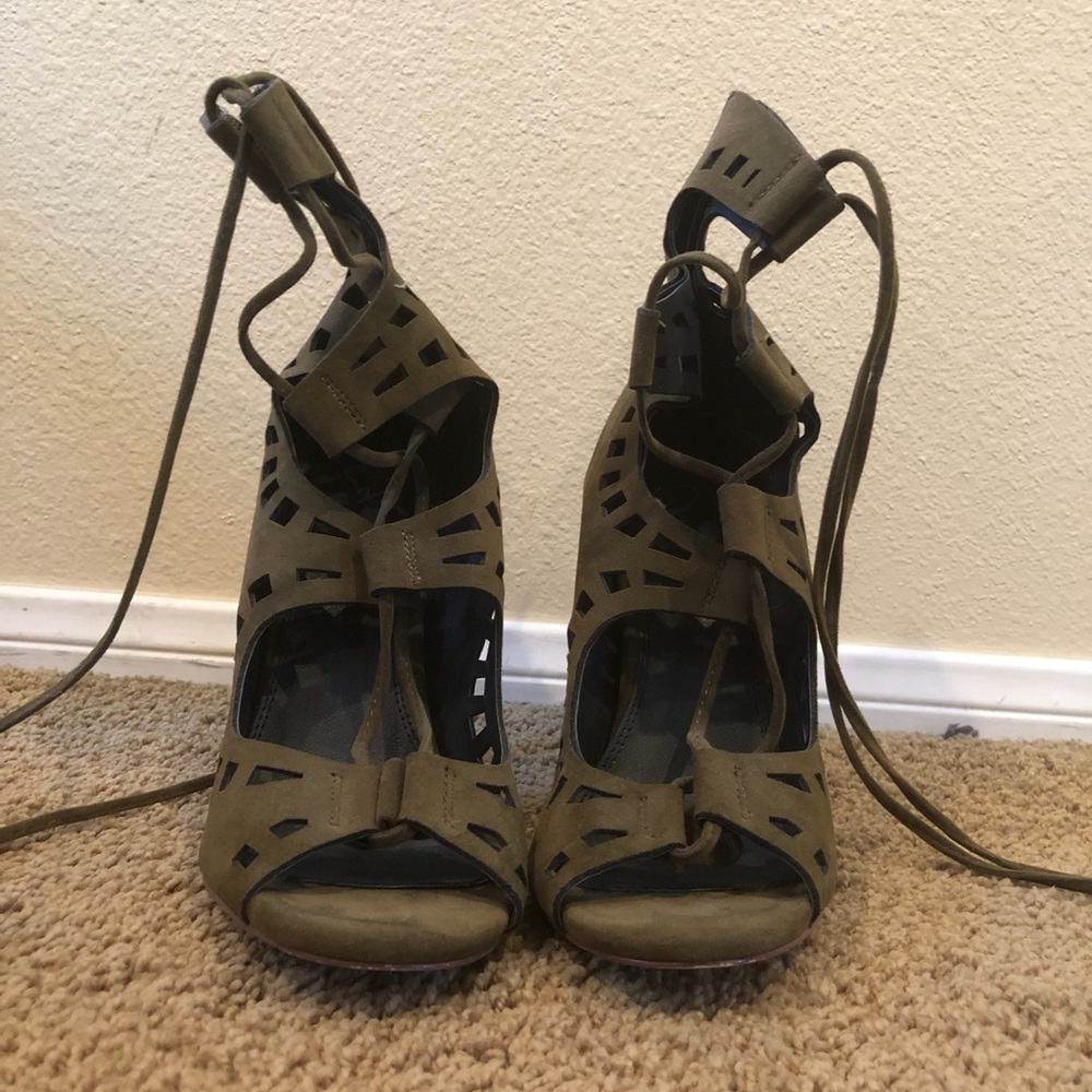 Windsor’s green strappy high heels